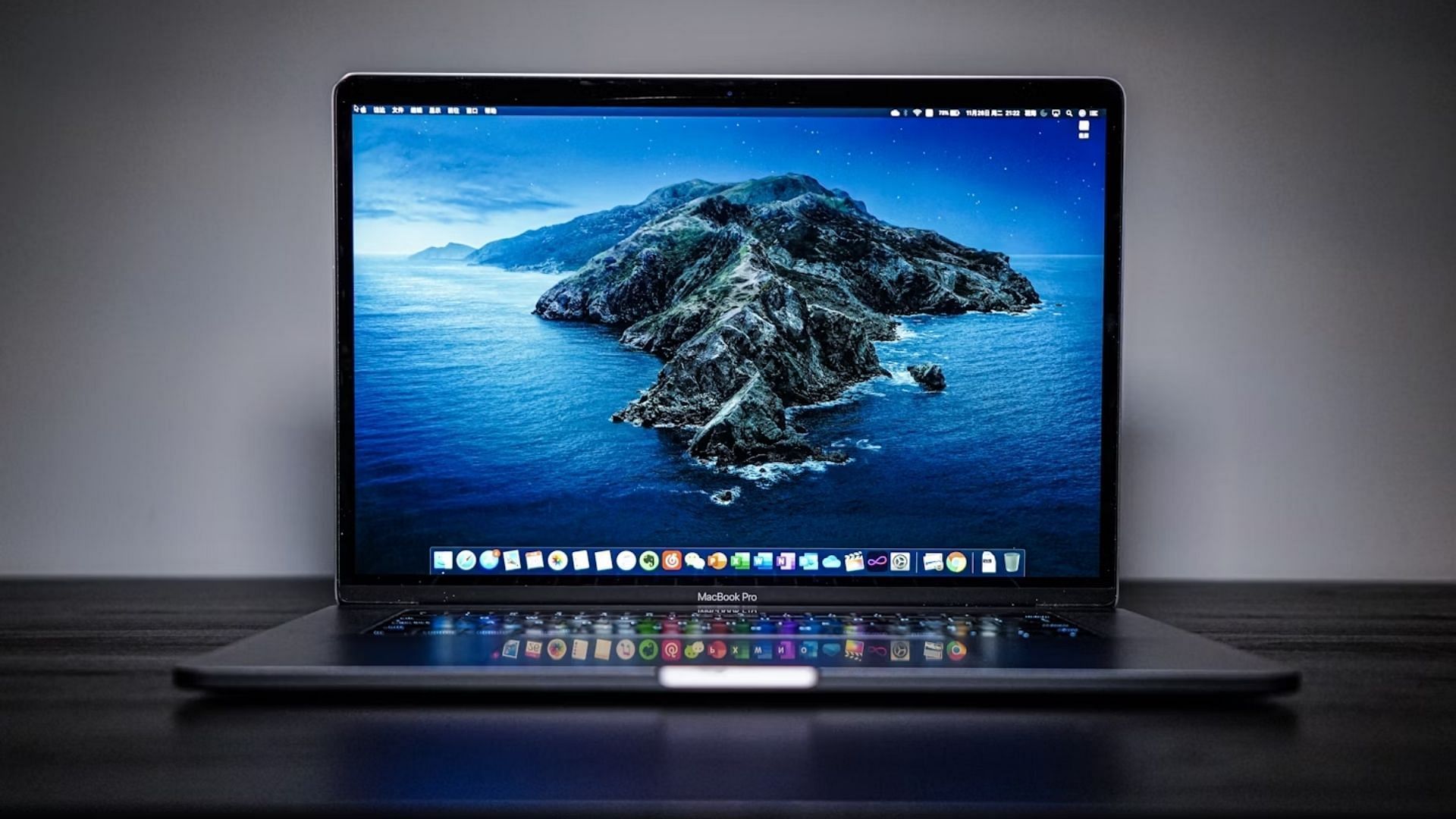 Restart MacBook Pro using the Apple menu and keyboard shortcuts (Image via Unsplash/yuhaimedia)