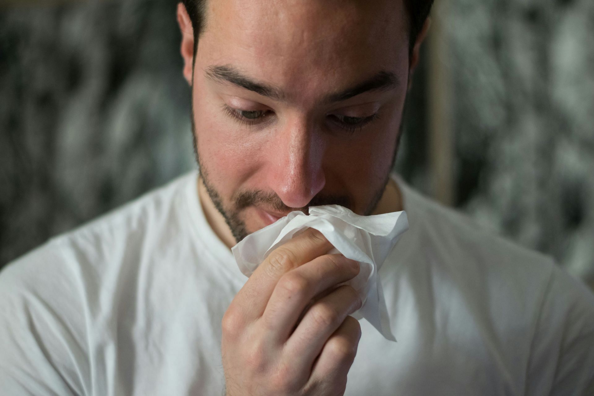 Dry cough, fever or chills are the most common symptoms (Image via Unsplash/ Brittany Colette)