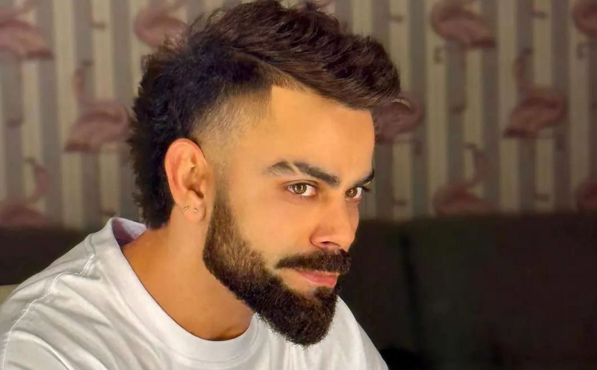 Virat Kohli with a new hair style ahead of IPL 2024. 