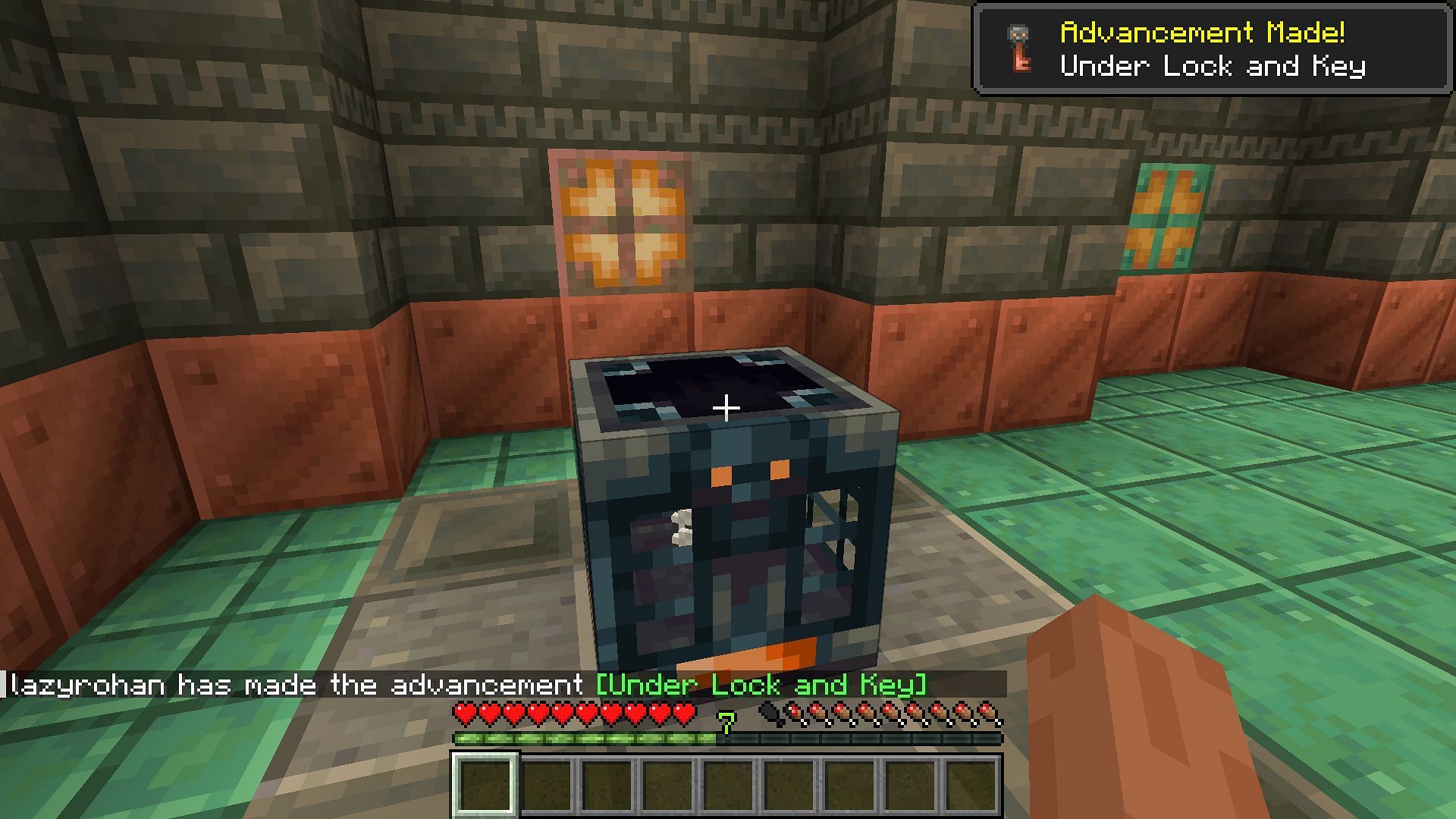Completing the Under Lock and Key advancement in Minecraft (Image via Mojang)