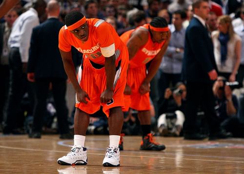 Jonny Flynn and Paul Harris of the Syracuse Orange.