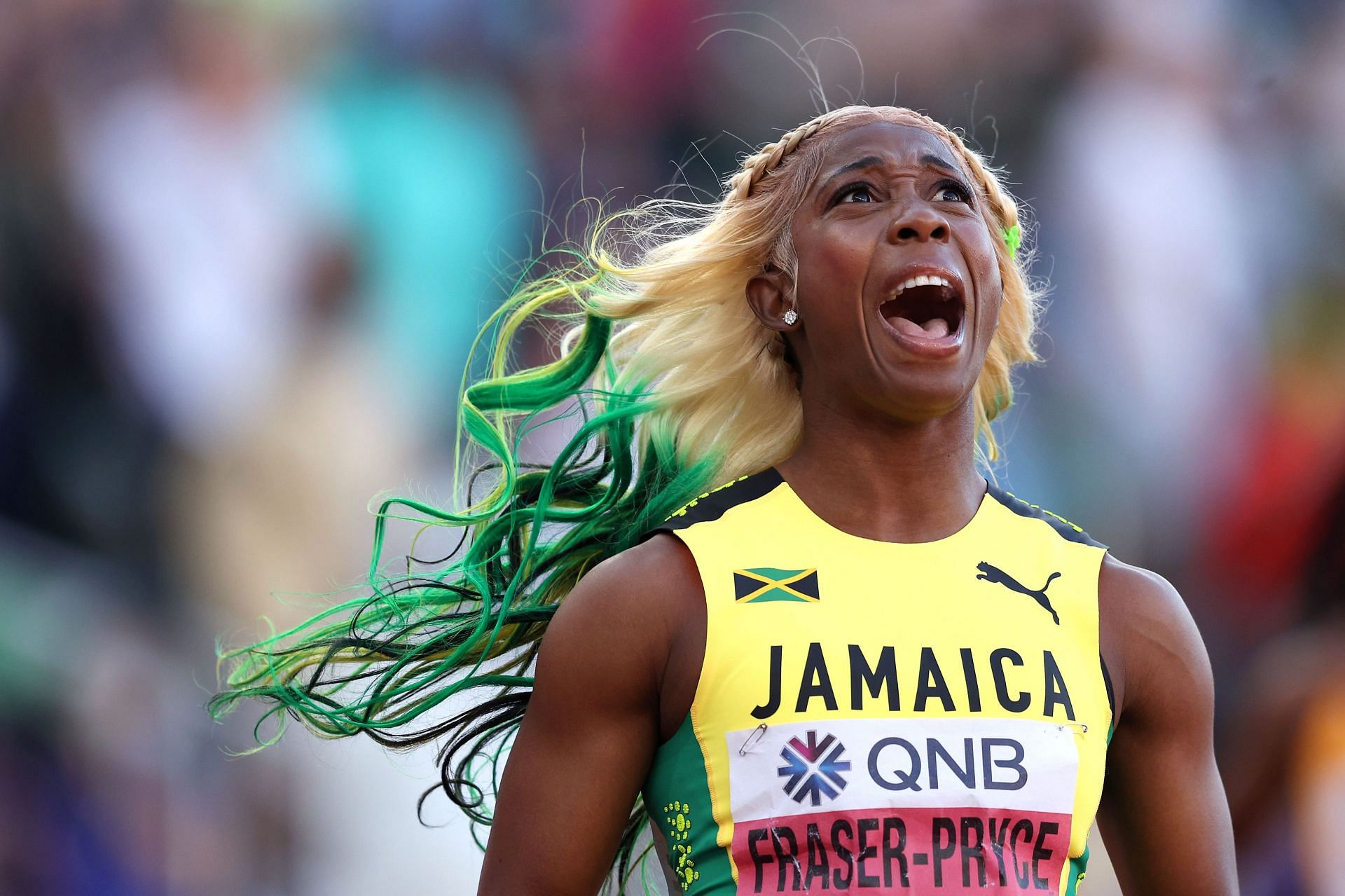 Shelly-Ann Fraser-Pryce of Team Jamaica celebrates after winning gold at the World Athletics Championships in Oregon. (Photo by Patrick Smith/Getty Images)