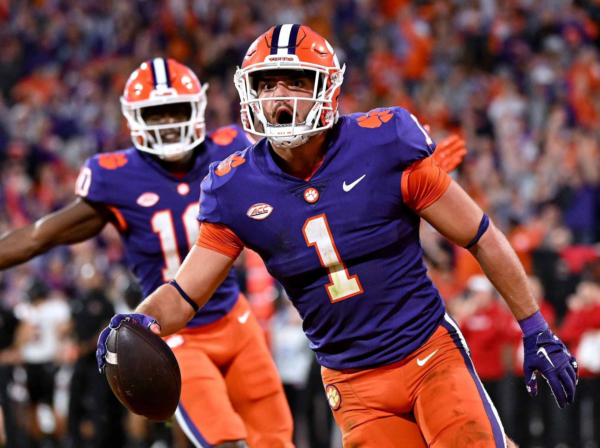 Will Shipley #1 of the Clemson Tigers reacts after scoring a touchdown against the Louisville Cardinals