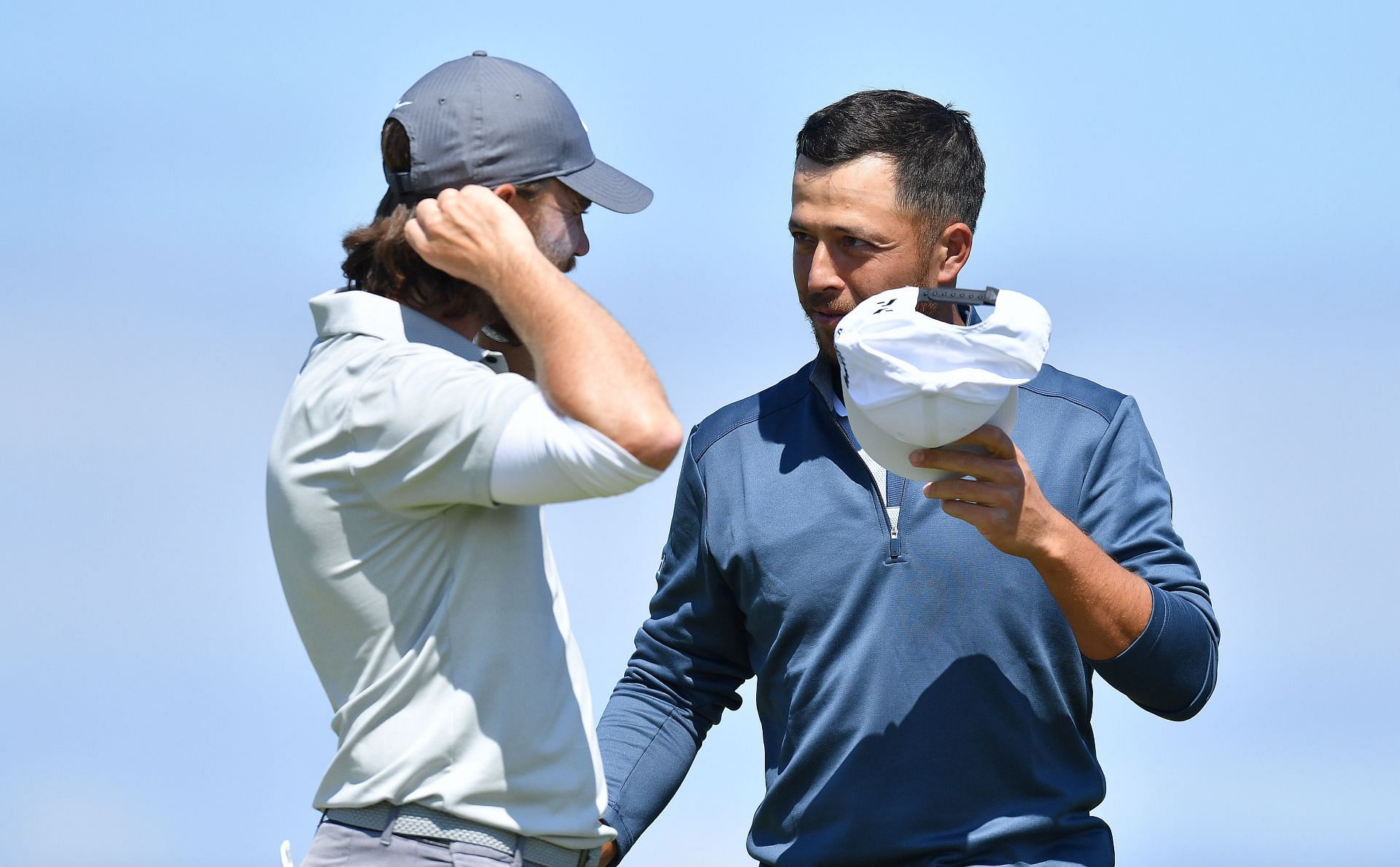 Xander Schauffele and Tommy Fleetwood (Image via Mark Runnacles/Getty Images)