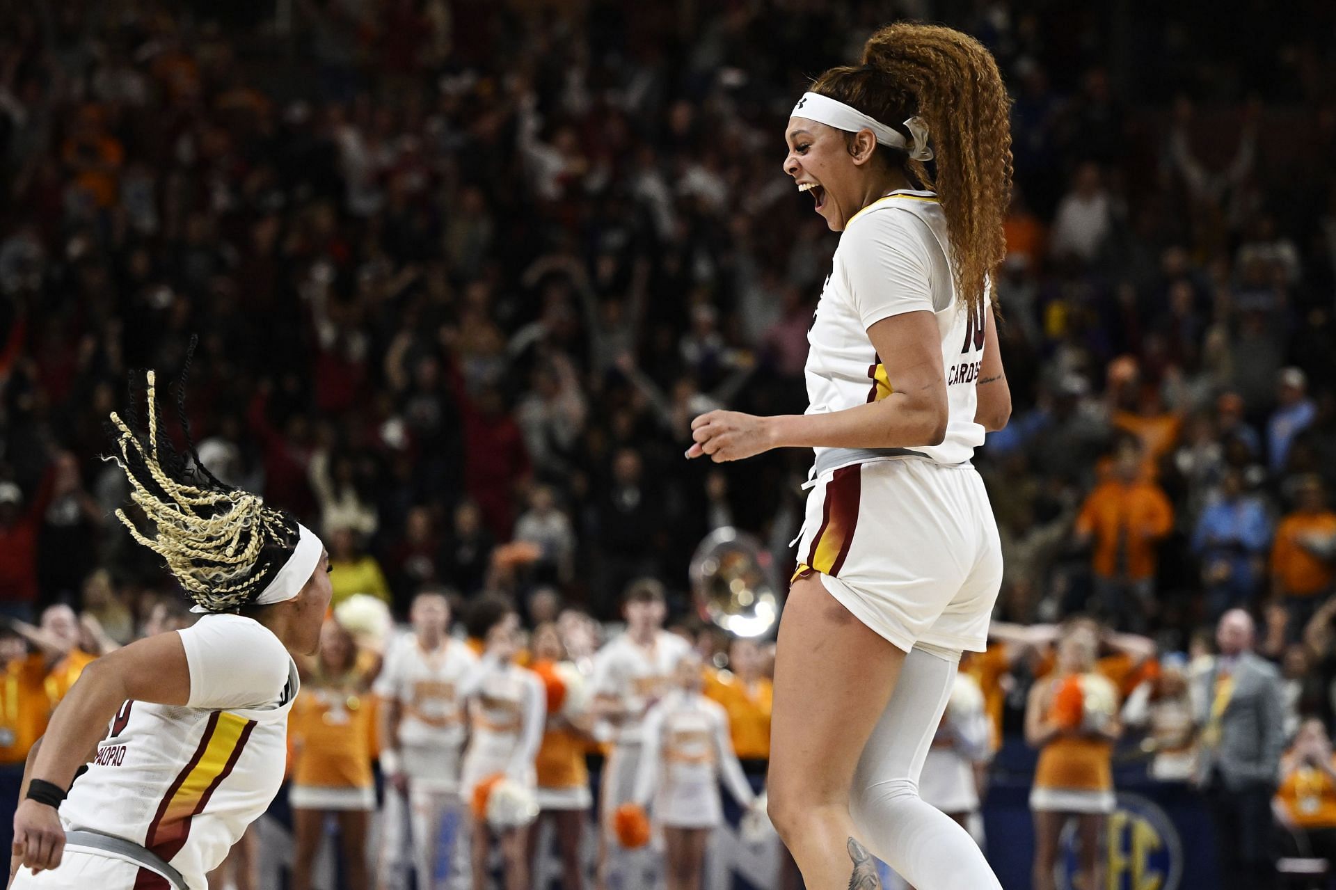 Kamilla Cardoso celebrates her buzzer-beater against Tennessee