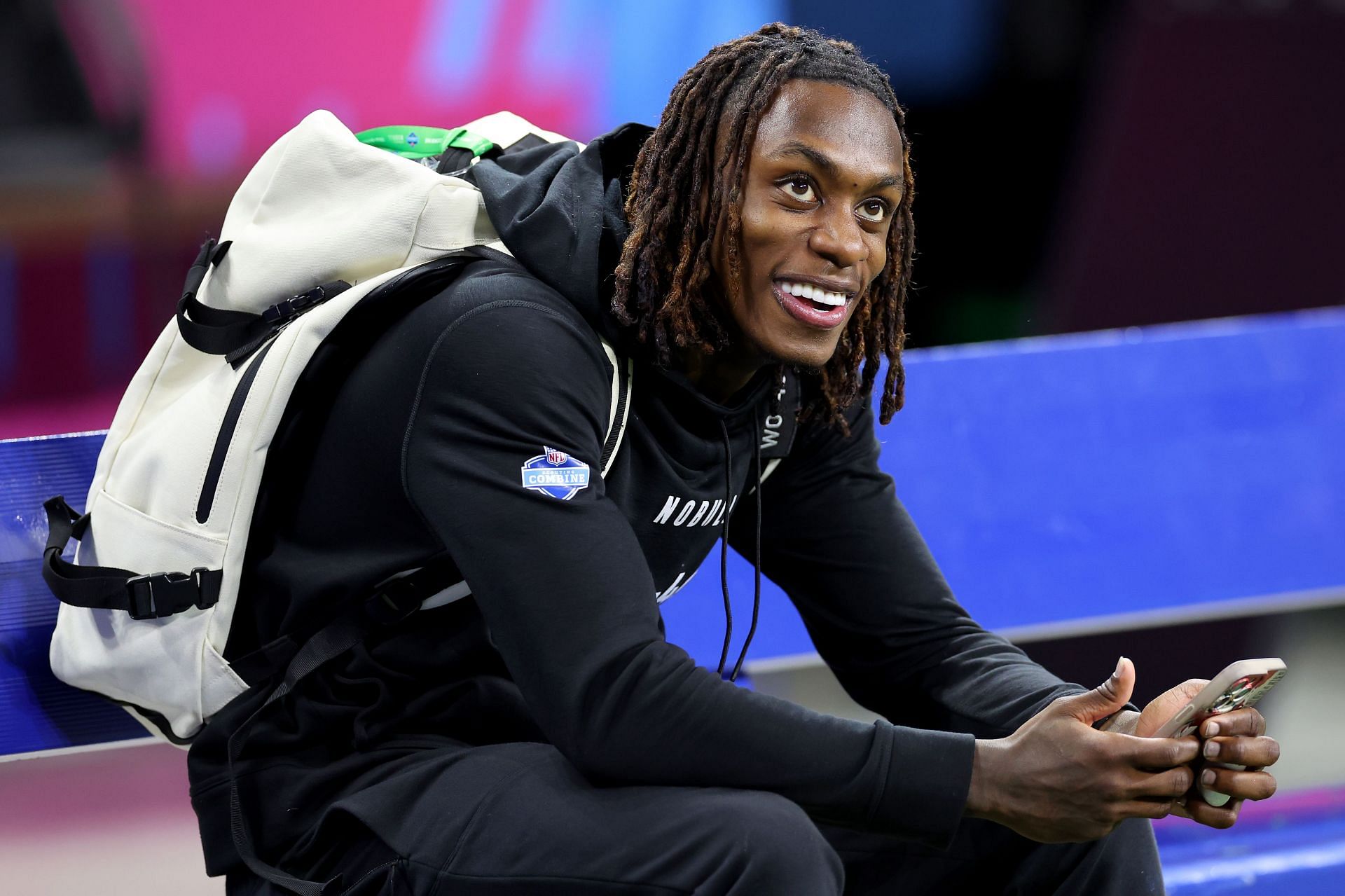 Xavier Worthy #WO40 of Texas smiles after breaking the 40-yard dash record