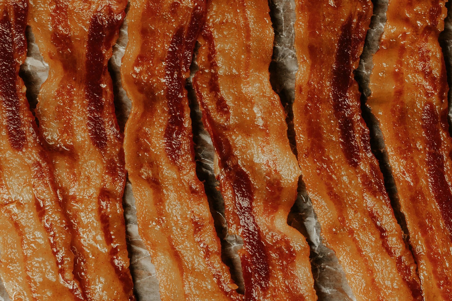 Uncooked bacon can be very harmful to your health (Image via Unsplash/ Wright Bran Bacon)