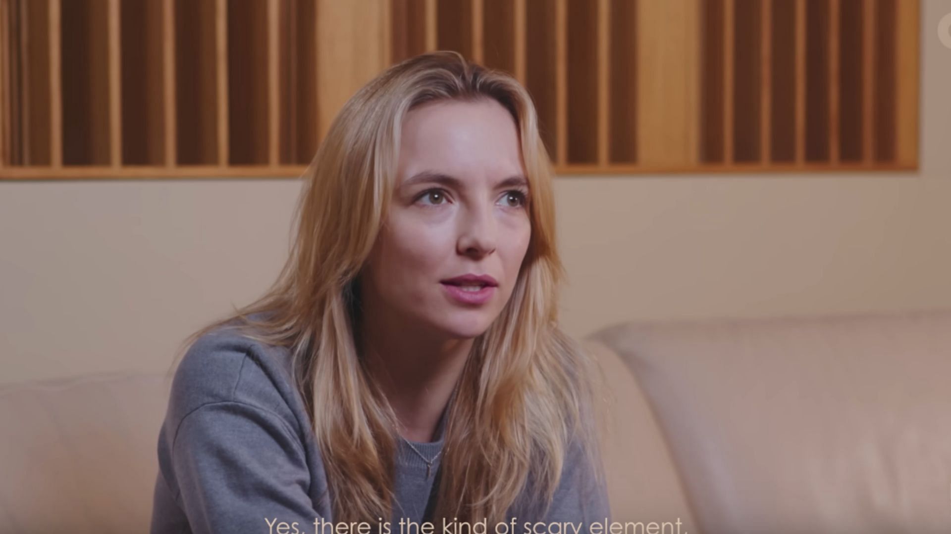 Jodie Comer takes on the role of Emily Hartwood in the game (Image via YouTube/ PlayStation)