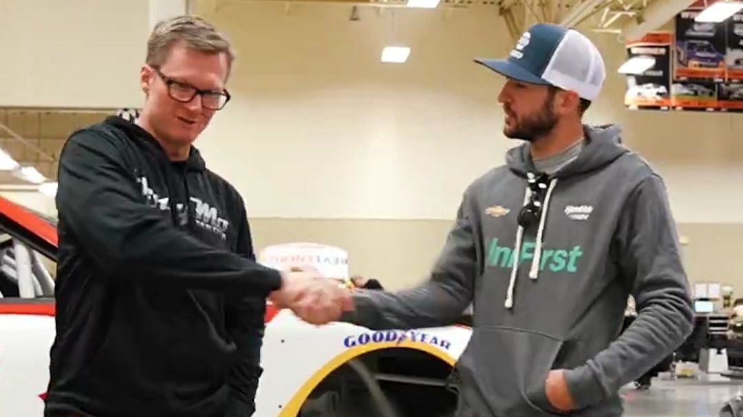 Chase Elliott and Dale Earnhardt Jr. in the Hendrick Motorsports garage (Image from X)