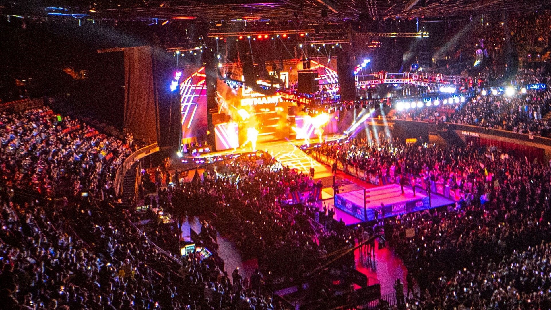 A packed crowd watches a live AEW Dynamite
