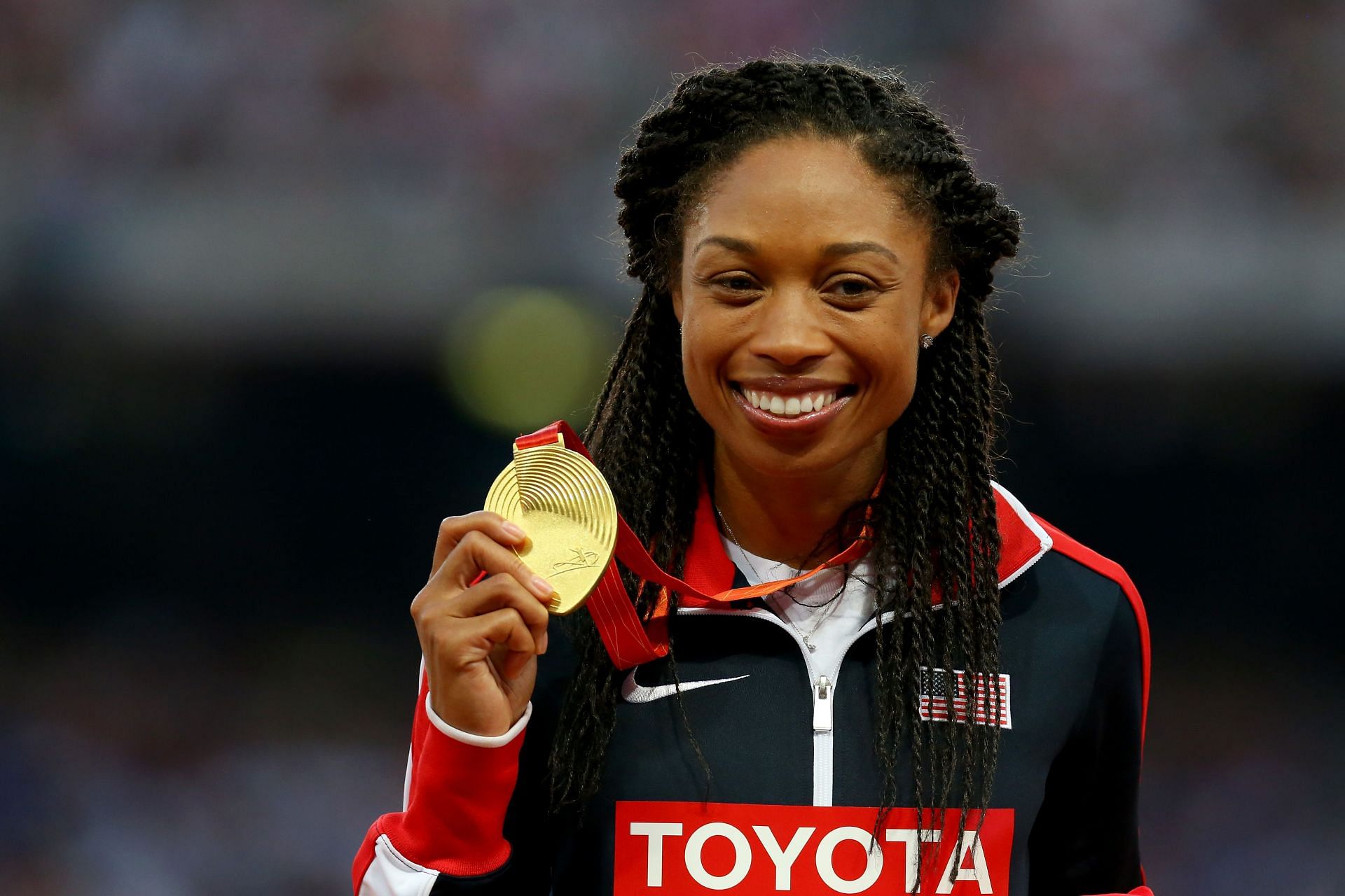 Gold medalist Allyson Felix of the United States poses on the podium during the medal ceremony for the Women&#039;s 400-meter final during day seven of the 15th IAAF World Athletics Championships at Beijing National Stadium on August 28, 2015, in Beijing, China. (Photo by Alexander Hassenstein/Getty Images for IAAF)
