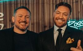 Conor McGregor reacts as coach John Kavanagh celebrates Alta getting listed on New York Stock Exchange