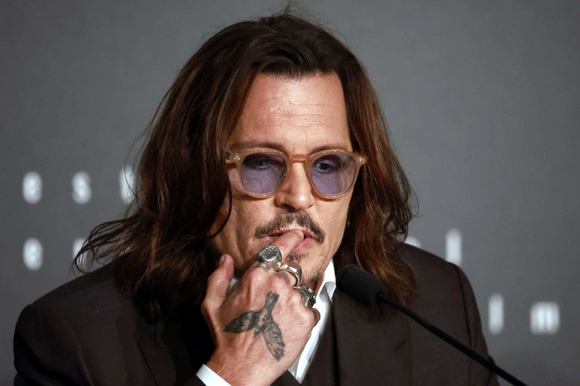 Johnny Depp at The 76th Annual Cannes Film Festival (via Getty/Guillaume Horcajuelo)