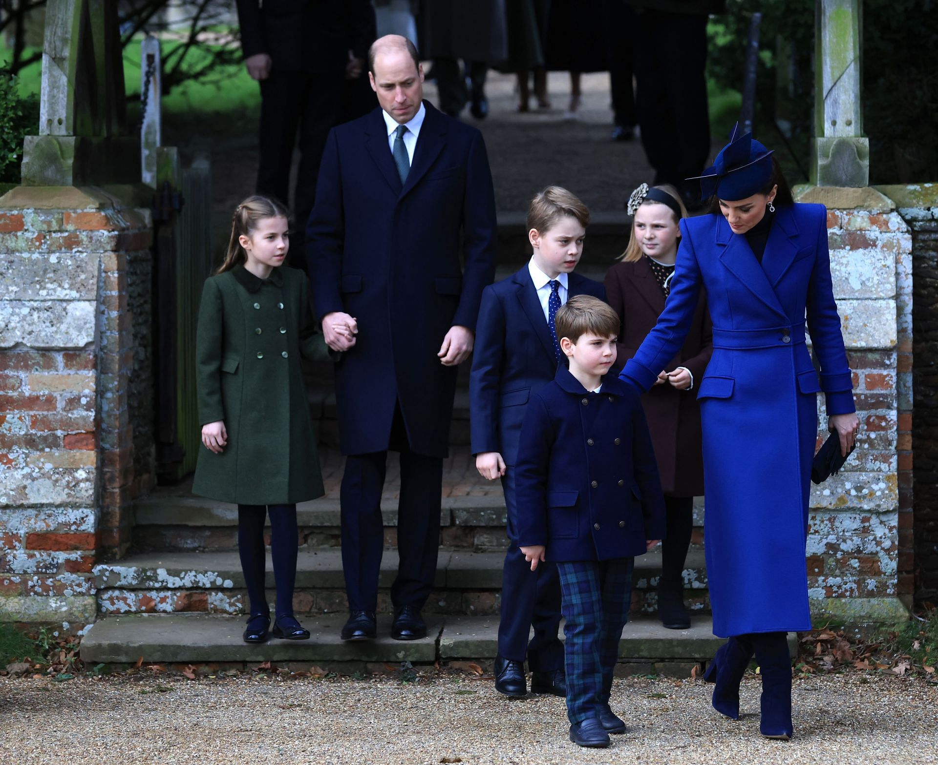  (L-R) Princess Charlotte, Prince William, Prince of Wales, Prince George, Prince Louis, Mia Tindall, and Catherine, Princess of Wales, attend the Christmas Morning Service at Sandringham Church on December 25, 2023 (Image via Getty)