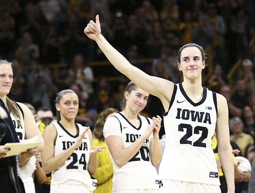 Guard Caitlin Clark #22 of the Iowa H. the crowd during senior day festivities.