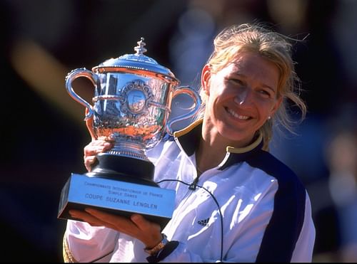 Steffi Graf pictured with her last Grand Slam trophy at the 1999 French Open