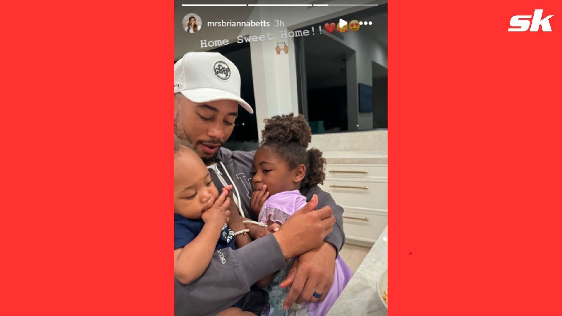 Brianna Betts shared a picture of Mookie Betts at home with their two children