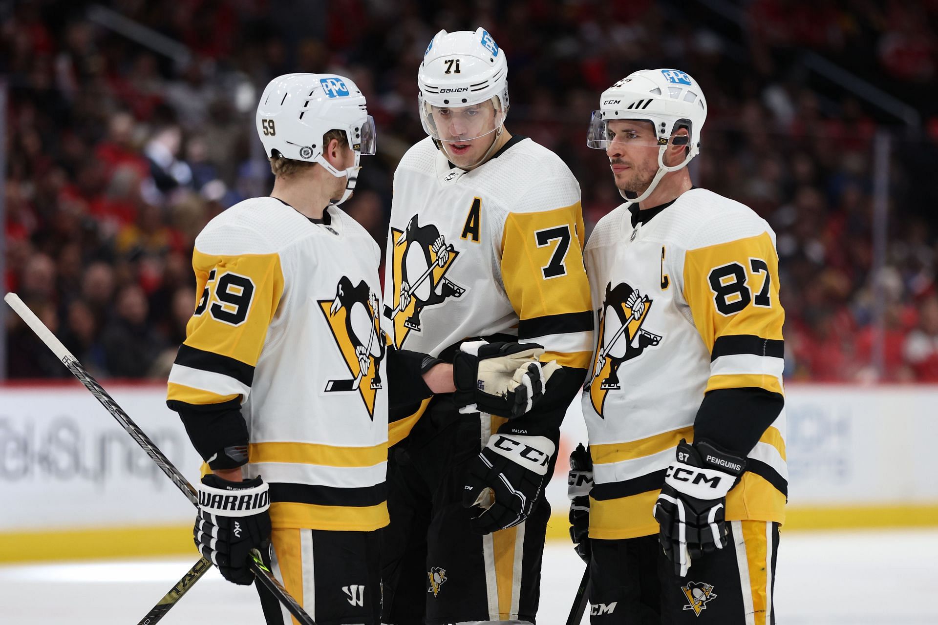 Jake Guentzel, Evgeni Malkin and Sidney Crosby of the Pittsburgh Penguins