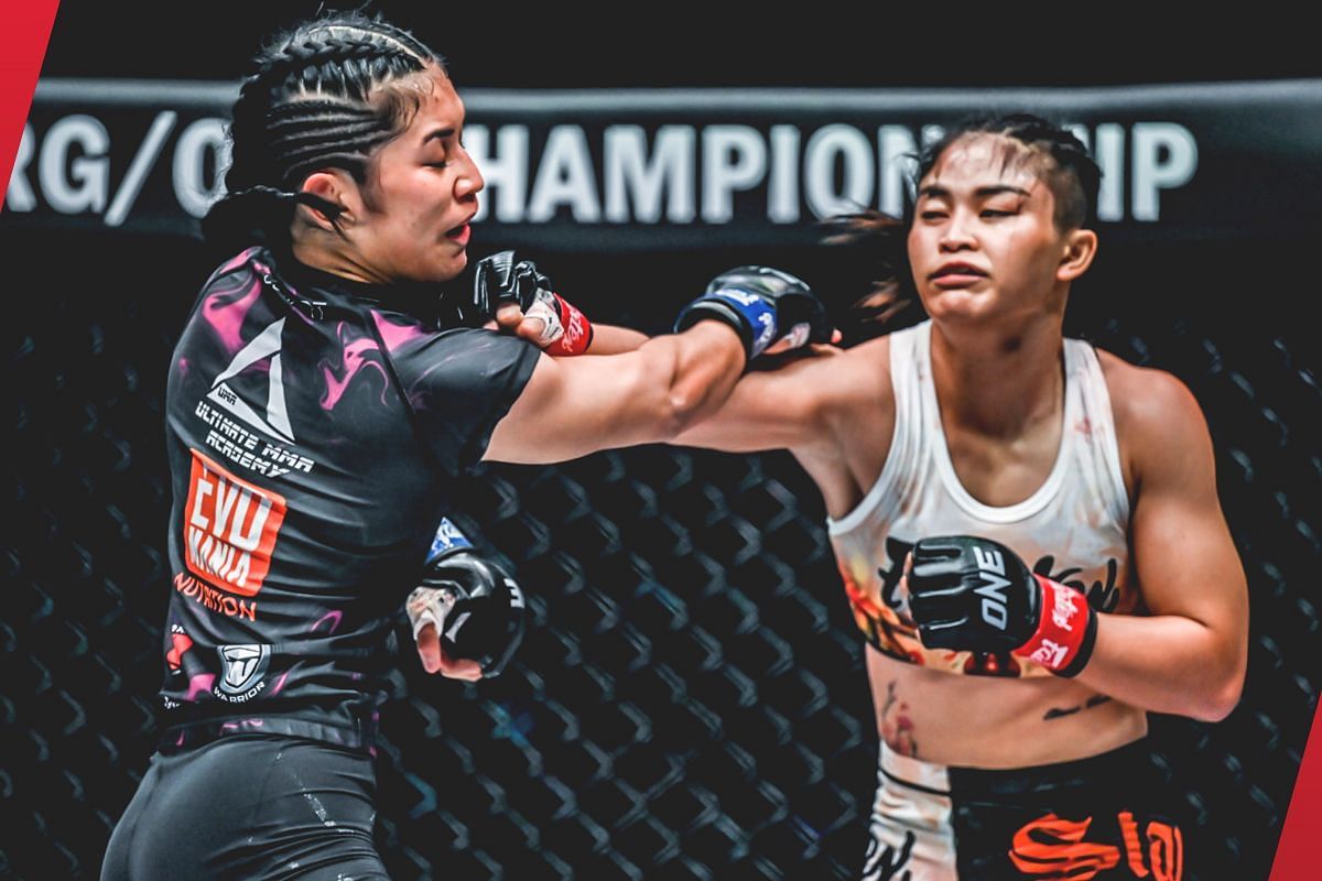 Stamp Fairtex lands a big hit on Jihin Radzuan (left) [Photo via: ONE Championship]