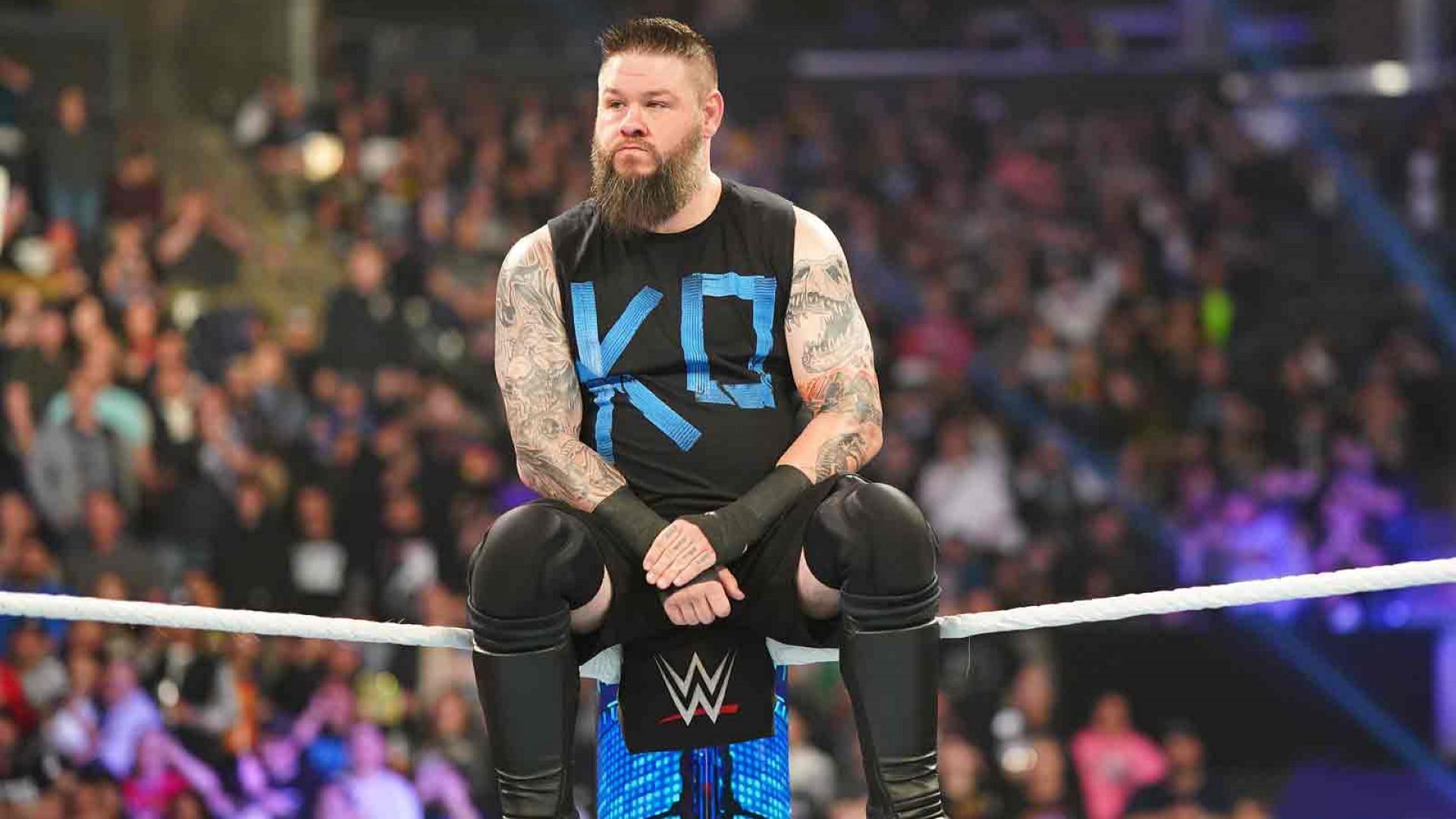 Kevin Owens waits in the ring on WWE SmackDown