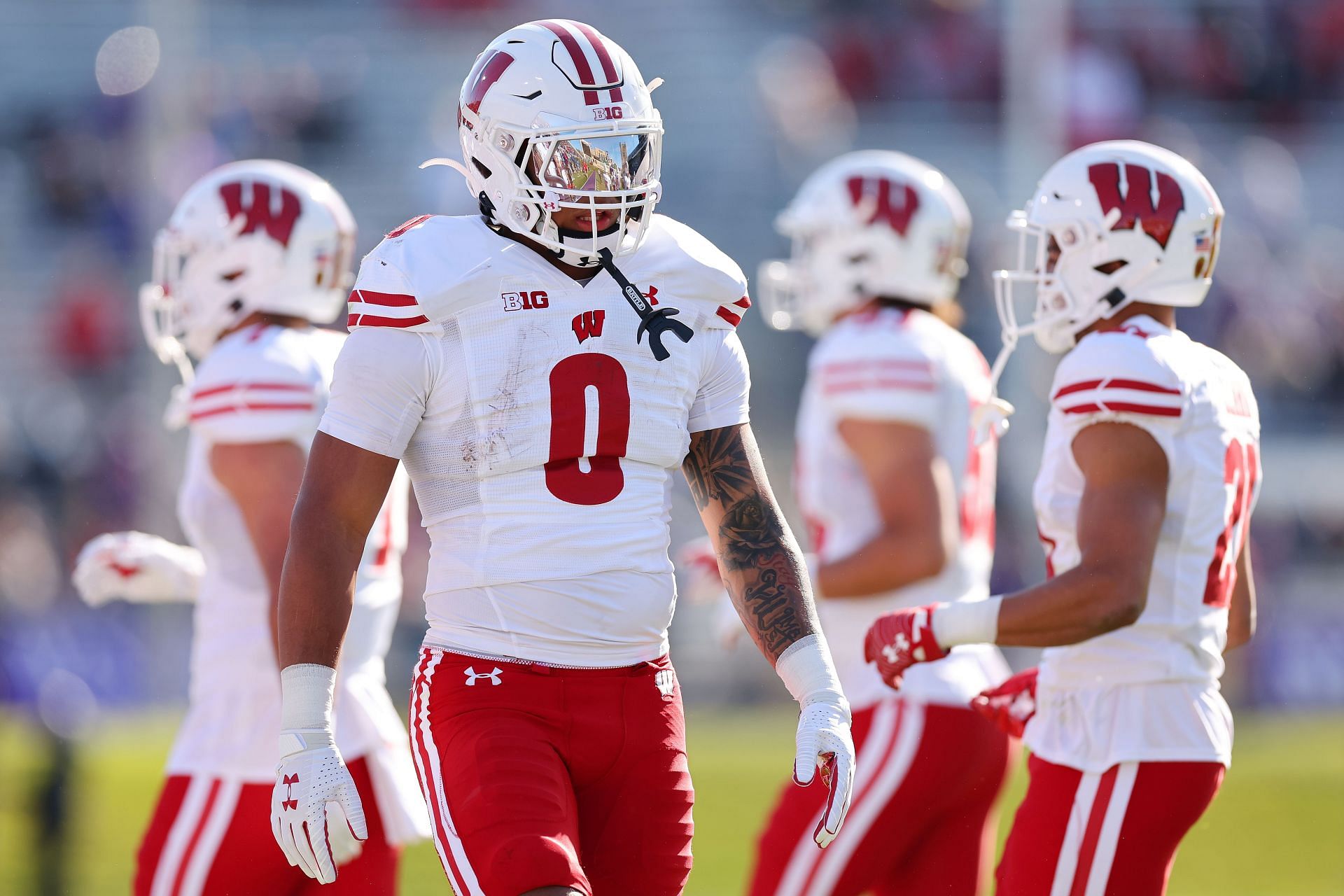 Braelon Allen #0 of the Wisconsin Badgers looks on against the Northwestern Wildcats