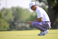 Doug Ghim lines up his putt during the 2024 Texas Children's Houston Open, Round One