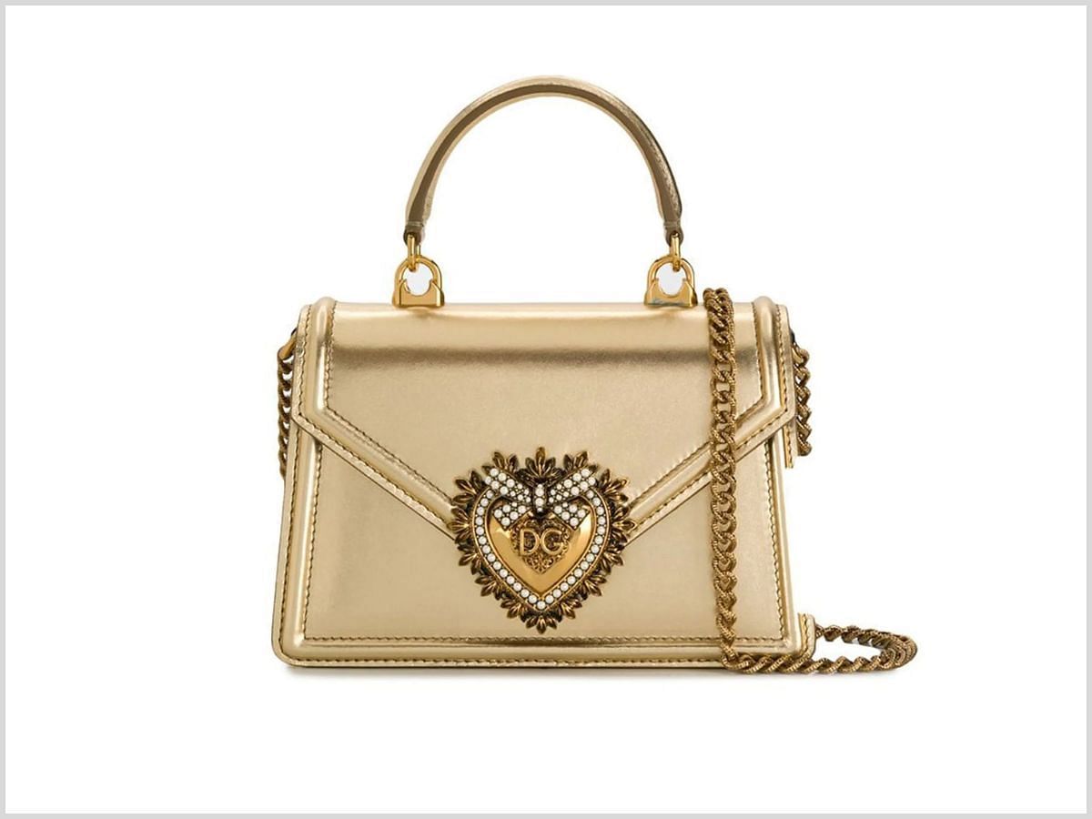 The Devotion leather top-handle bag (Image via Farfetch)