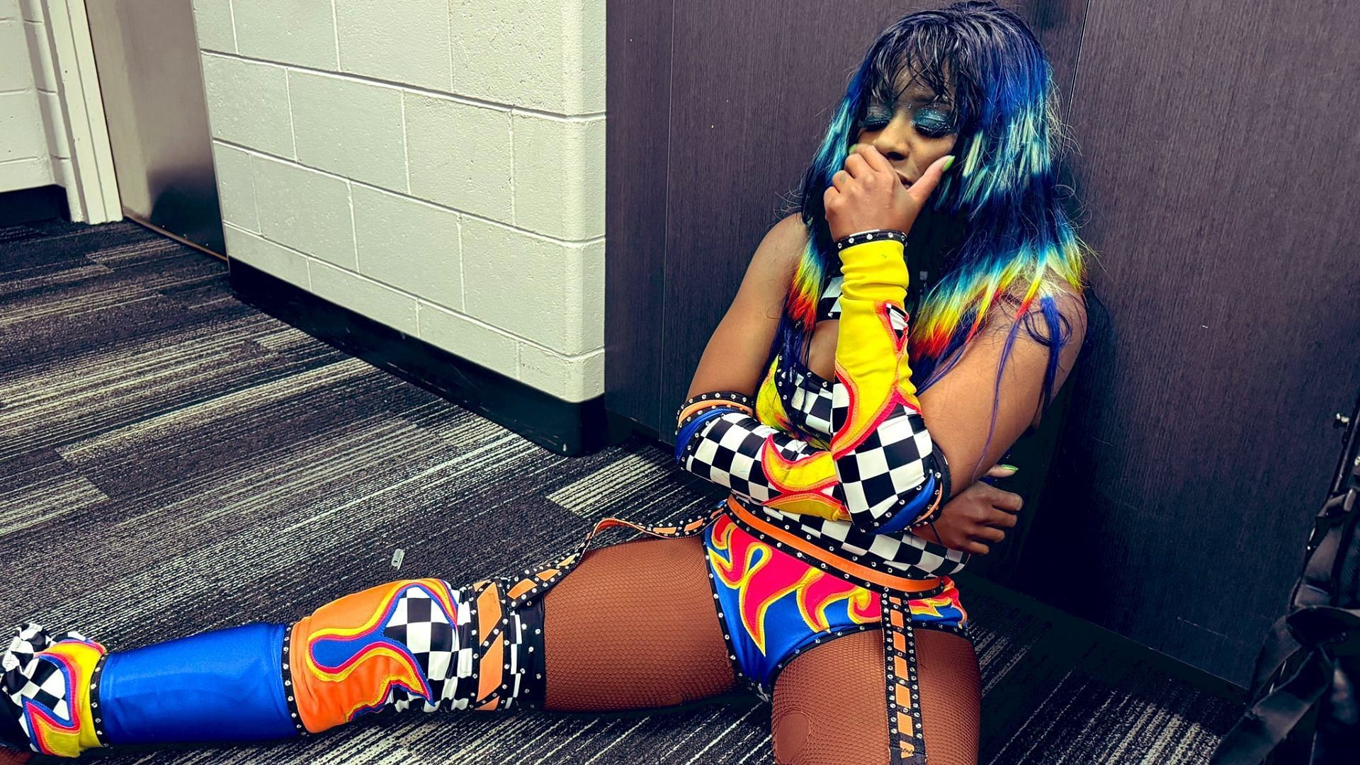 Naomi backstage on after her loss on SmackDown.