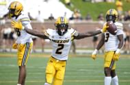 Defensive back Ennis Rakestraw Jr. #2 of the Missouri Tigers celebrates his interception against the Abilene Christian Wildcats