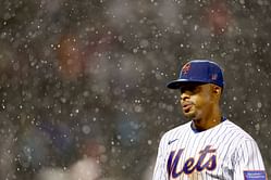 Francisco Lindor rocks a Neve brushed polo sweater with black cargo for the Mets' Opening Day drip