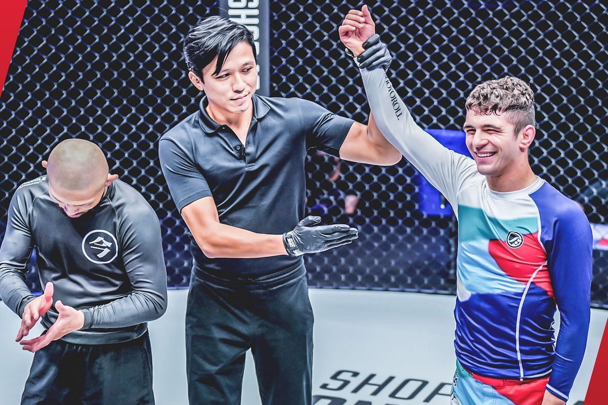 Mikey Musumeci with his hand raised in victory against Masakazu Imanari [Photo via: ONE Championship]