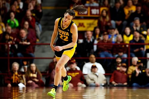 Caitlin Clark of the Iowa Hawkeyes reacts to her basket against the Minnesota Golden Gophers.