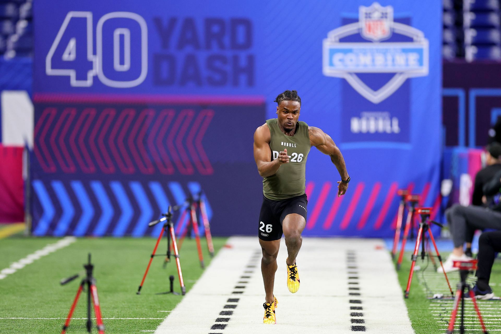Max Melton #DB26 of Rutgers participates in the 40-yard dash during the NFL Combine