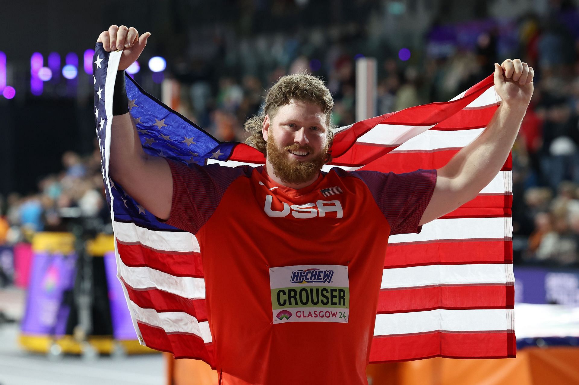 Ryan Crouser poses for a photo after winning the Men&#039;s Shot Put Final at the World Athletics Indoor Championships in Glasgow, Scotland.