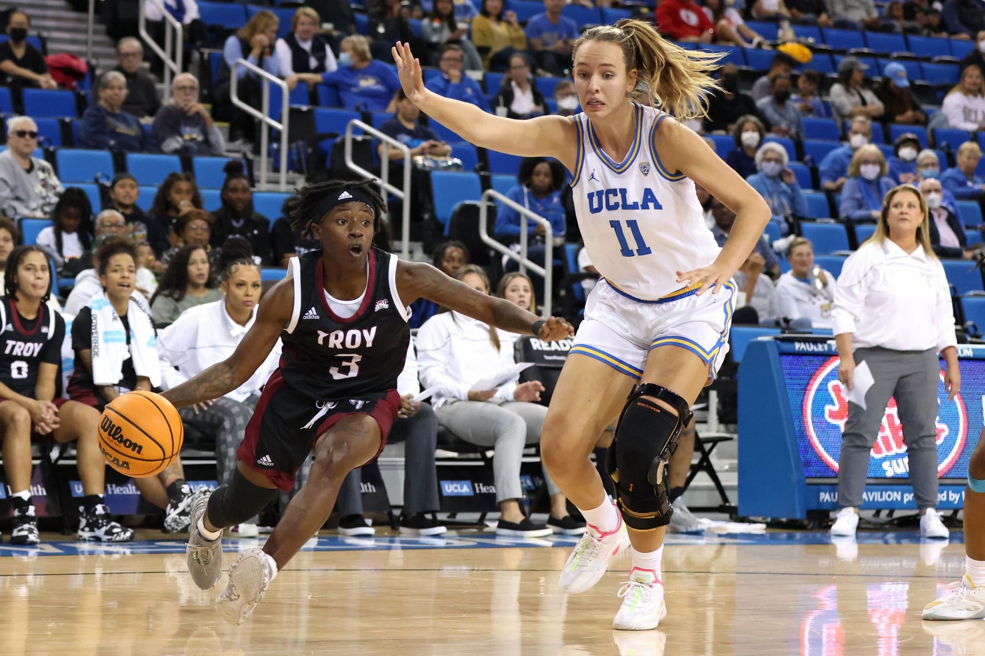 Emily Bessoir (right) is out for the season after reinjuring her knee.