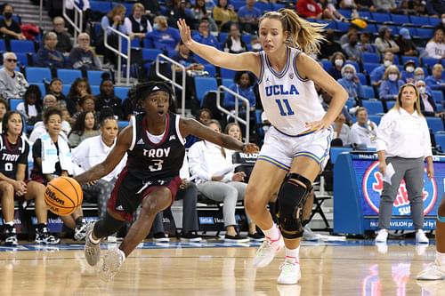 Emily Bessoir (right) is out for the season after reinjuring her knee.