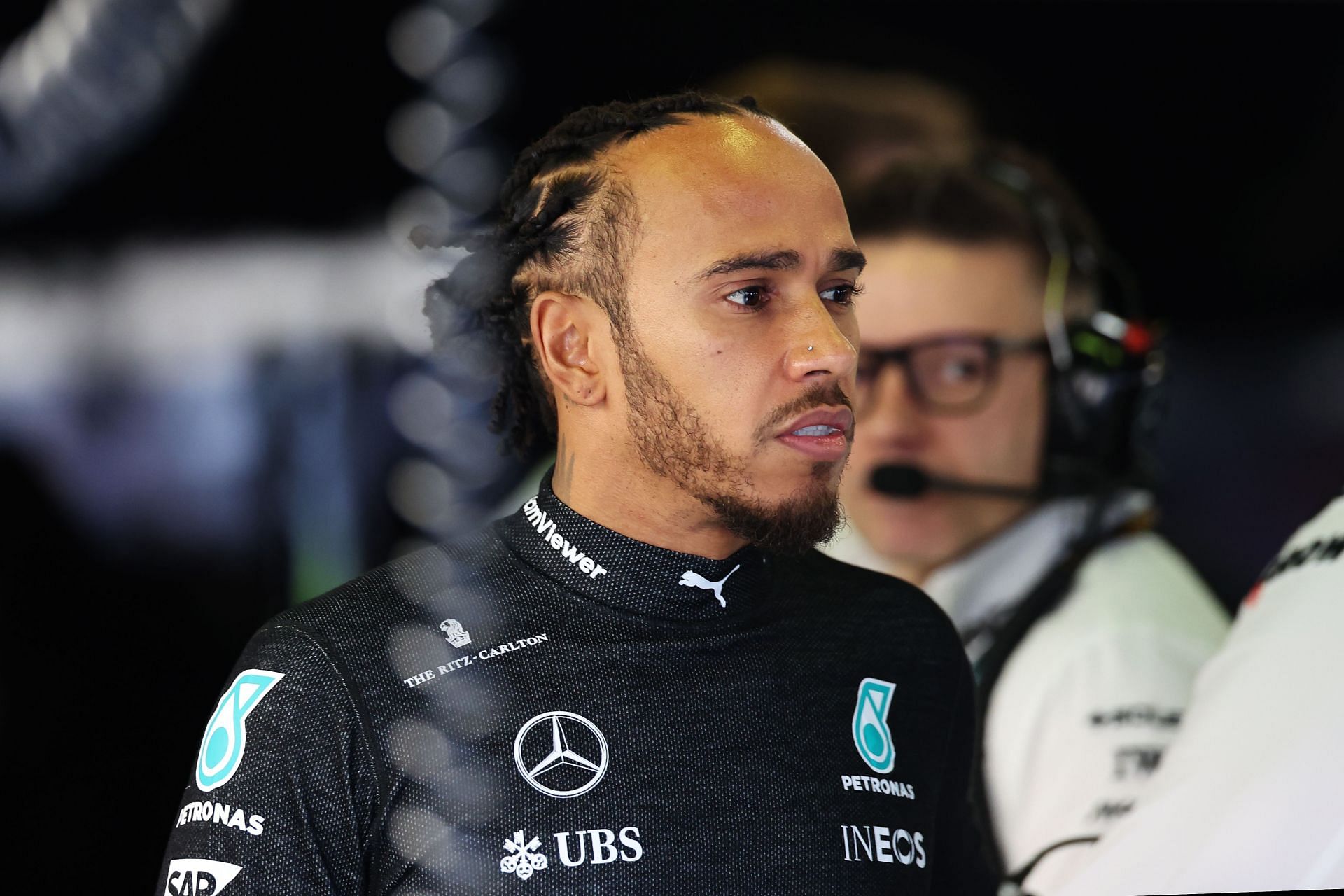 Lewis Hamilton of Great Britain and Mercedes looks on in the garage during final practice ahead of the F1 Grand Prix of Australia at Albert Park Circuit on March 23, 2024 in Melbourne, Australia. (Photo by Robert Cianflone/Getty Images