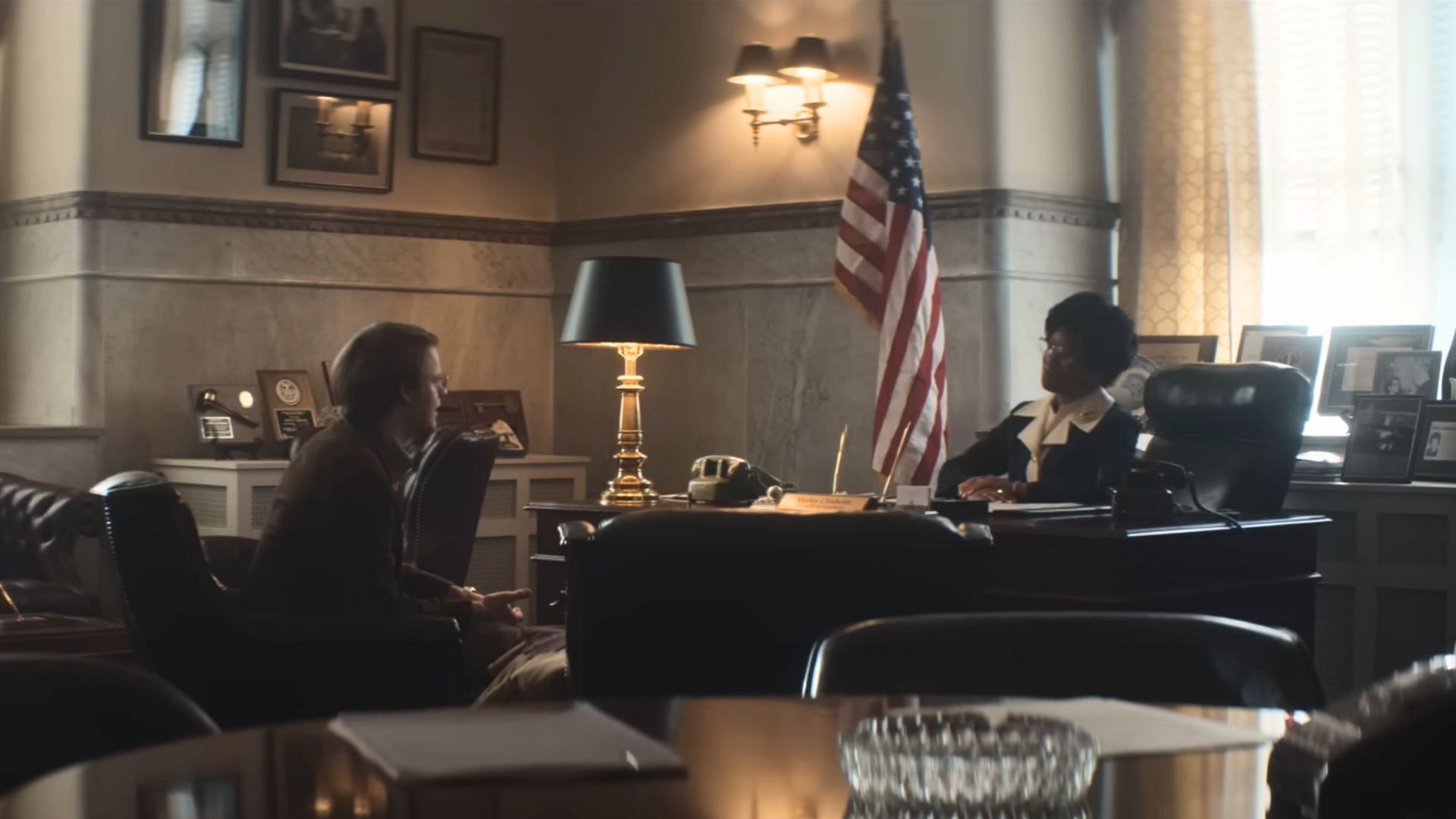A scene from the movie showing Chisholm&#039;s office (Image via Netflix)