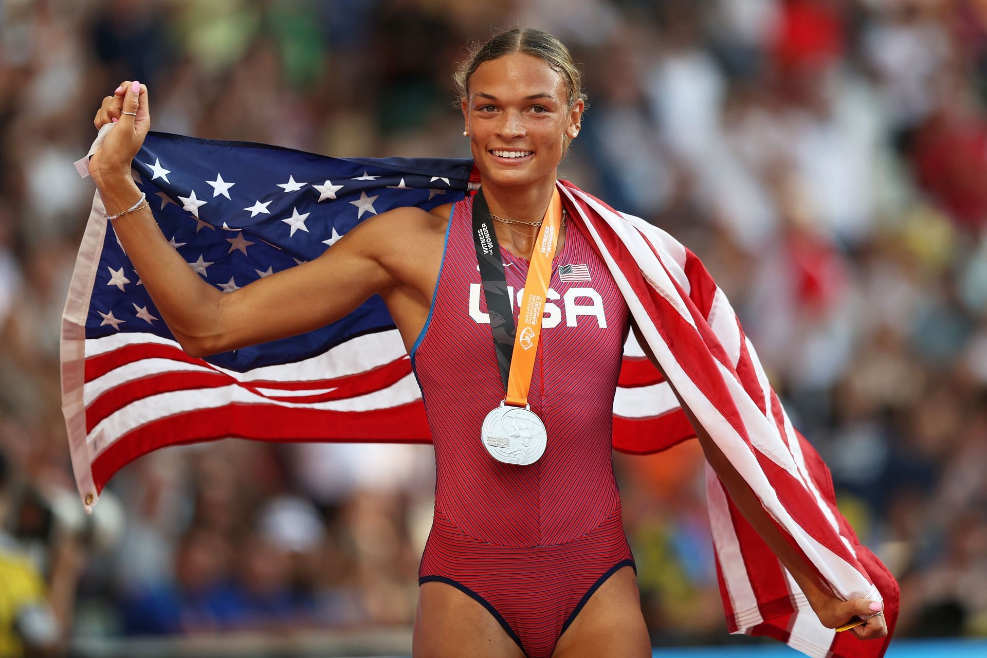 Anna Hall of Team United States celebrates with a United States flag after finishing second in the Women&#039;s 800m Heptathlon final during day two of the World Athletics Championships Budapest 2023 at National Athletics Centre on August 20, 2023, in Budapest, Hungary. (Photo by Michael Steele/Getty Images)