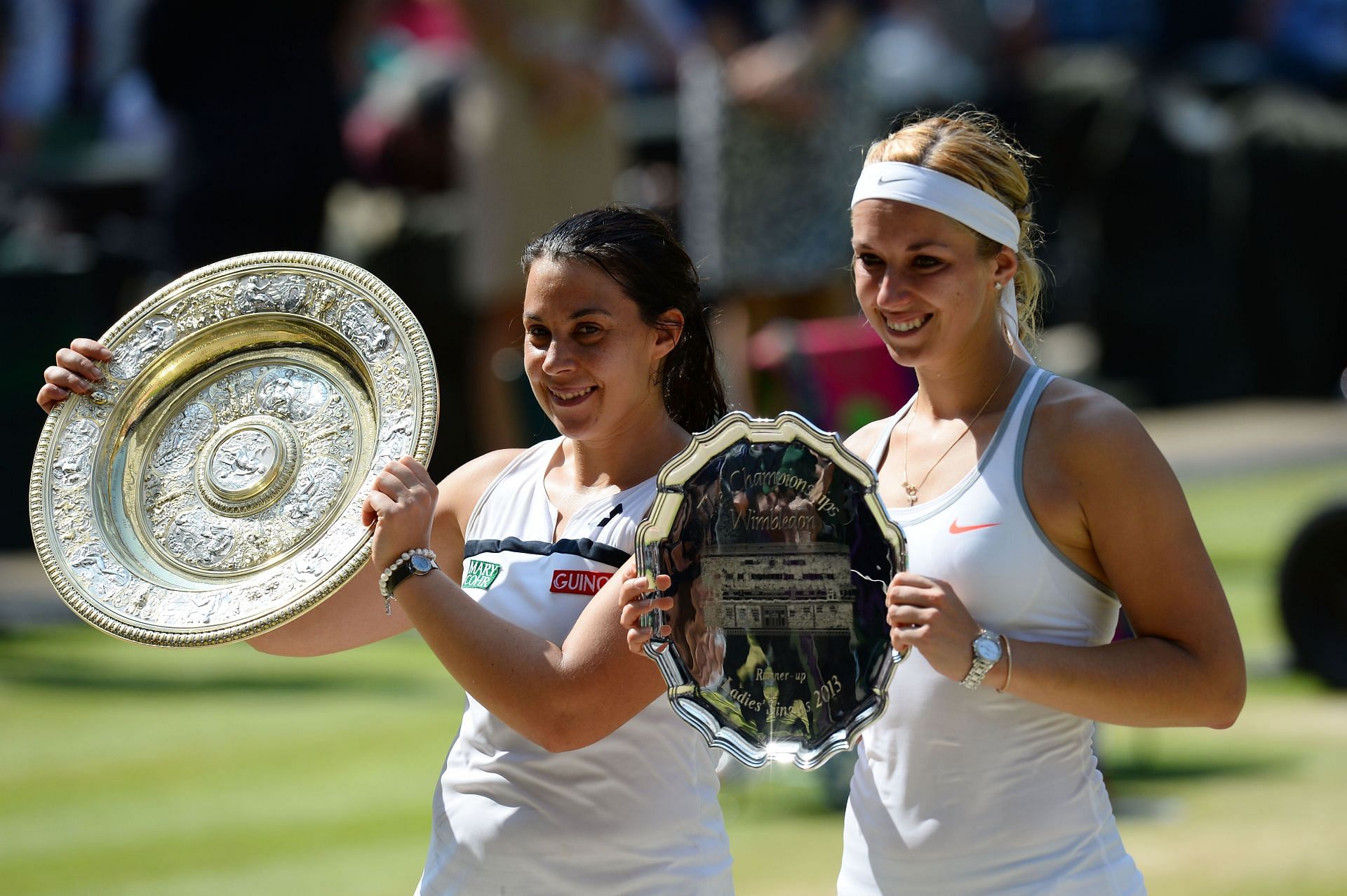 Sabine Lisicki (R) and Marion Bartoli pictured at the Wimbledon 2013