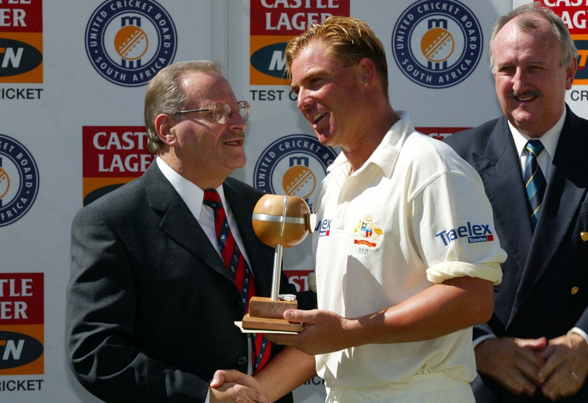 Shane Warne receiving Man of the Match award in his 100th Test