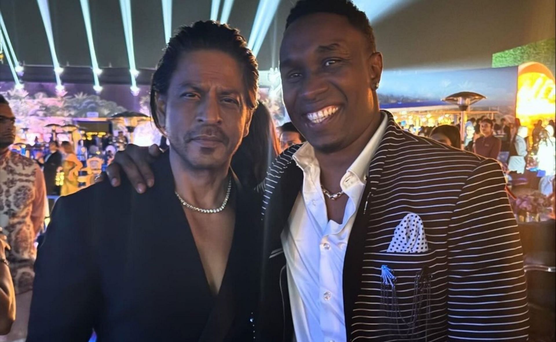 West Indies all-rounder Dwayne Bravo with Shah Rukh Khan. 