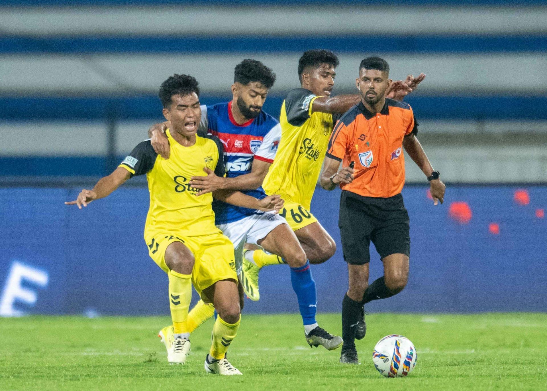Joseph Sunny jostling for the ball with former Nawab Nikhil Poojary against Bengaluru FC. [Hyd FC]