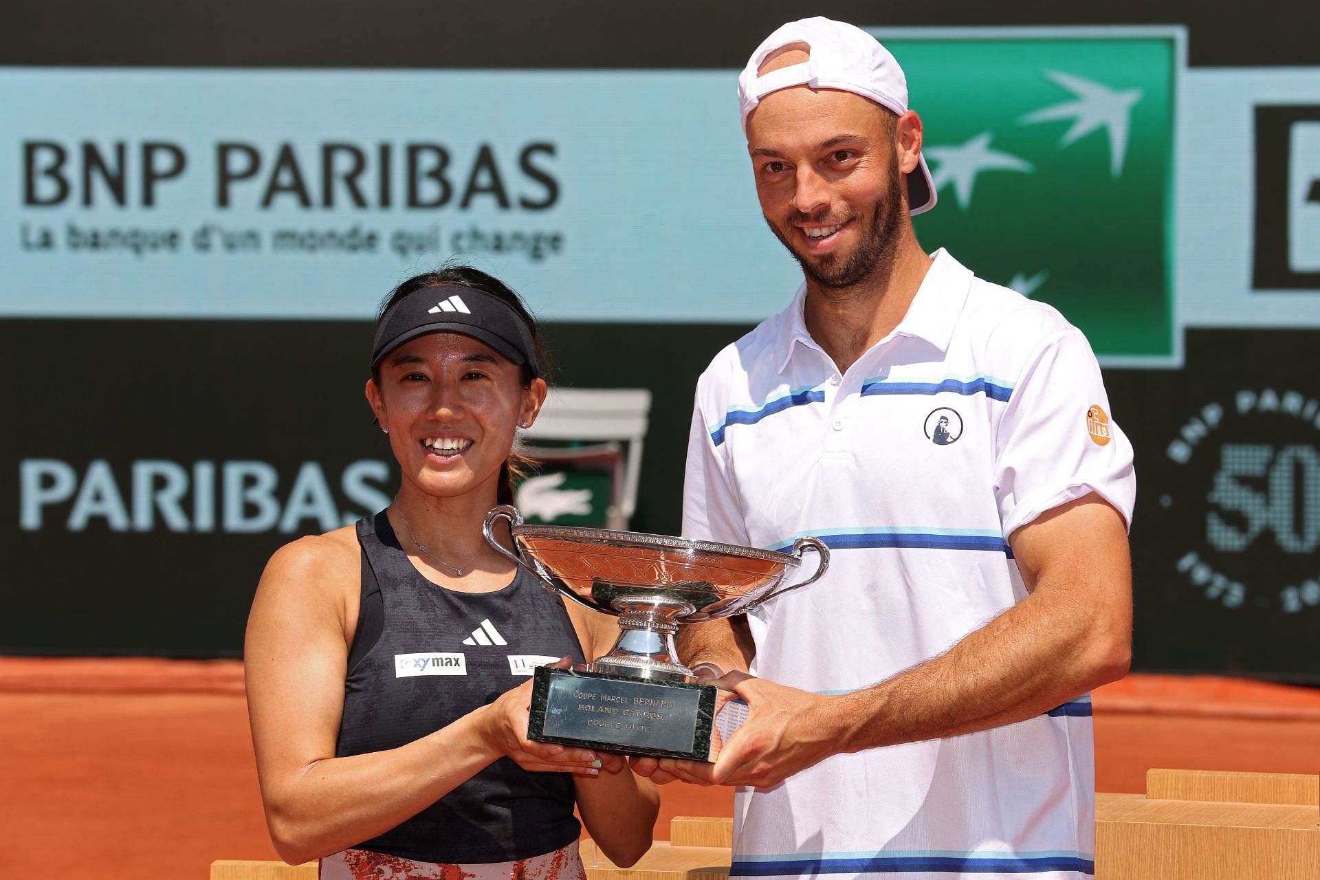 Miyu Kato with the 2023 French Open mixed doubles trophy.