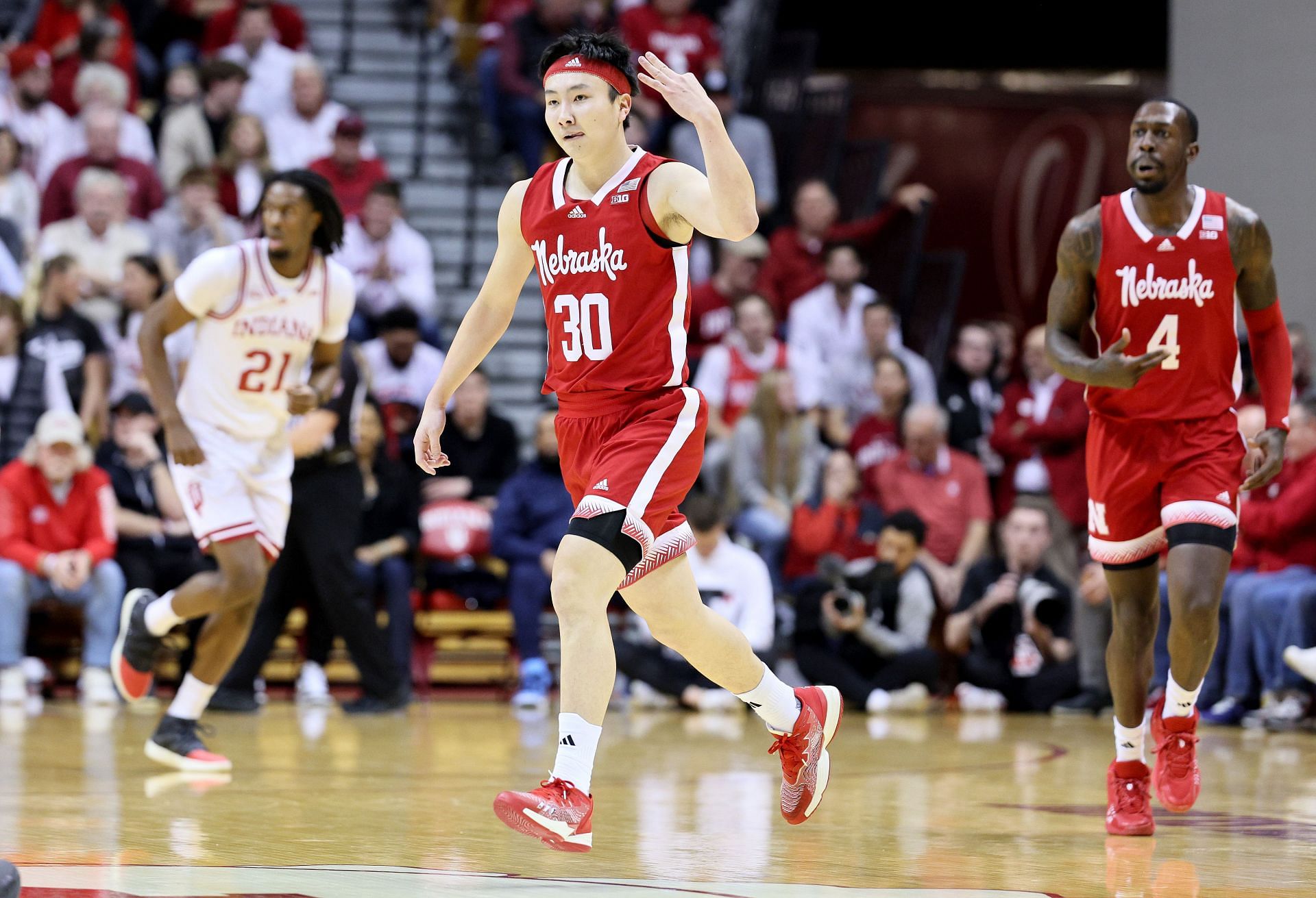 Keisei Tominaga celebrates after making a three-pointer.