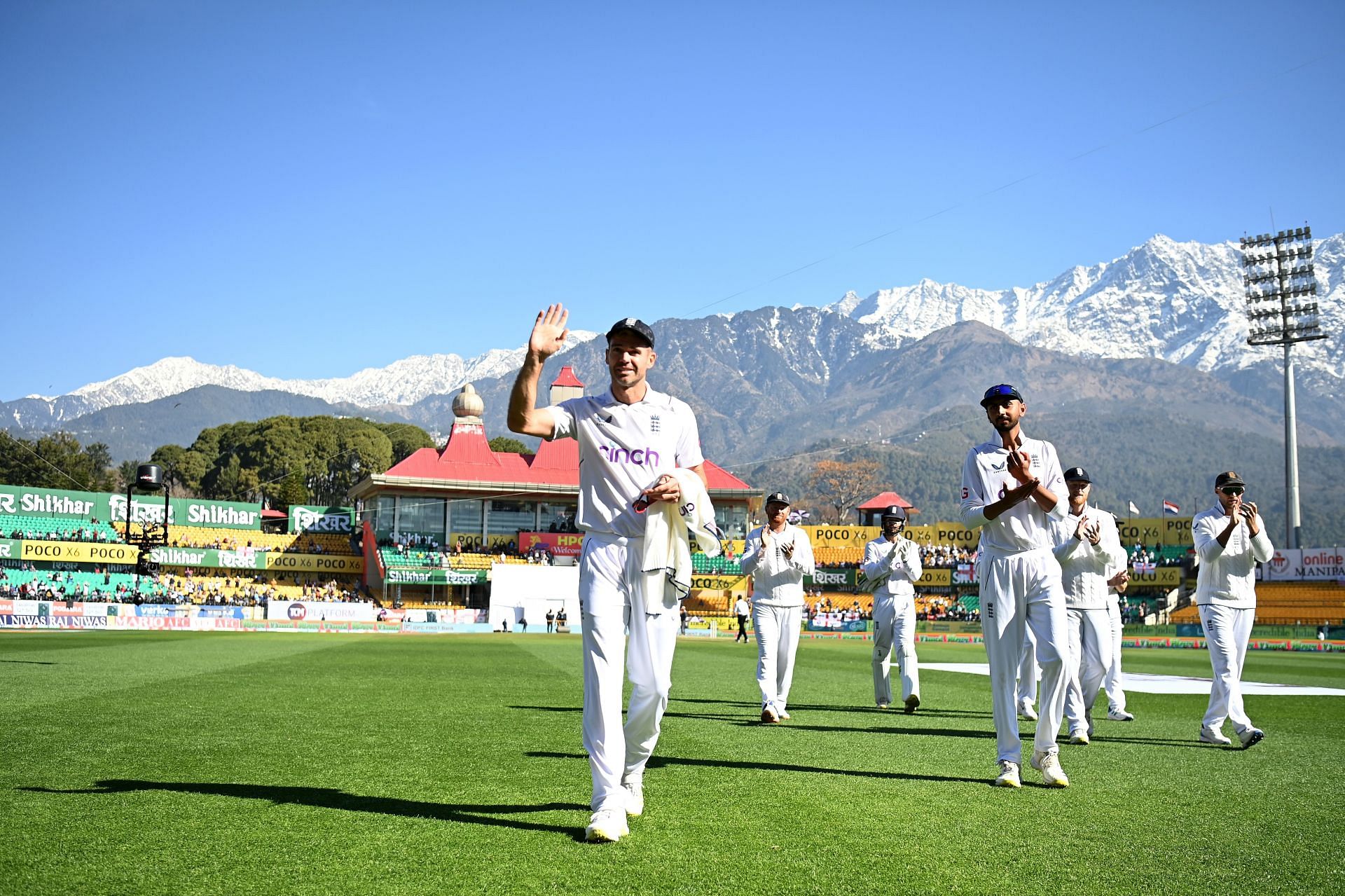 James Anderson leaves the fielding after taking his 700th Test wicket.