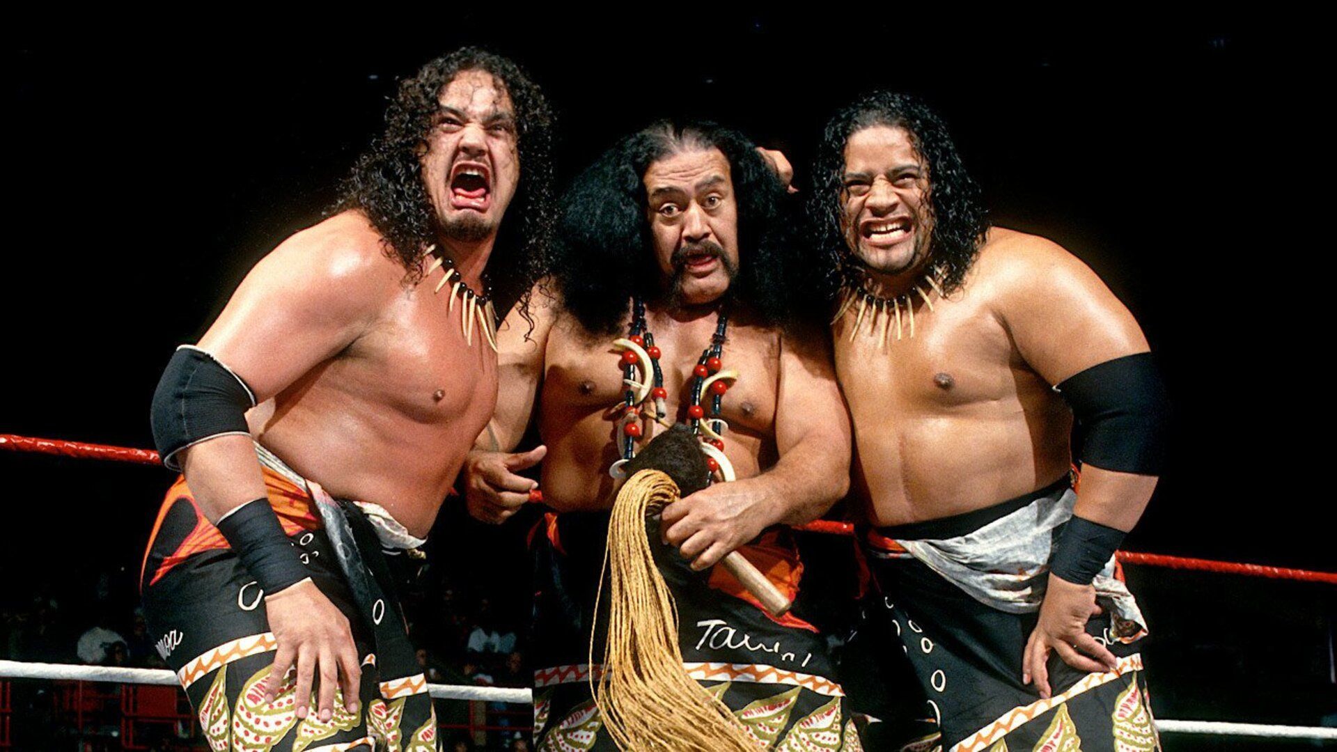 Afa The Wild Samoan poses with The Headshrinkers