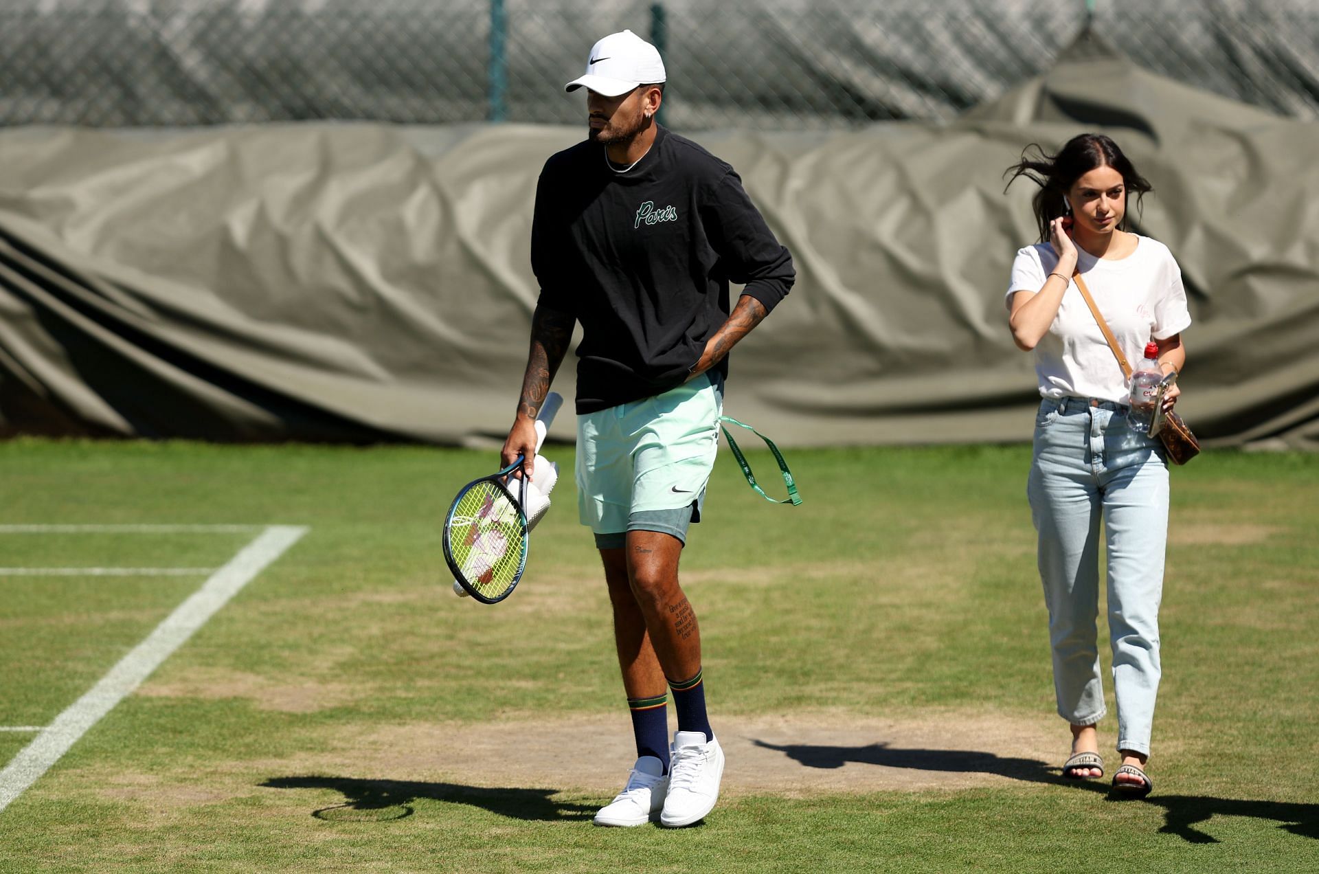 Nick Kyrgios (L) and Costeen Hatzi