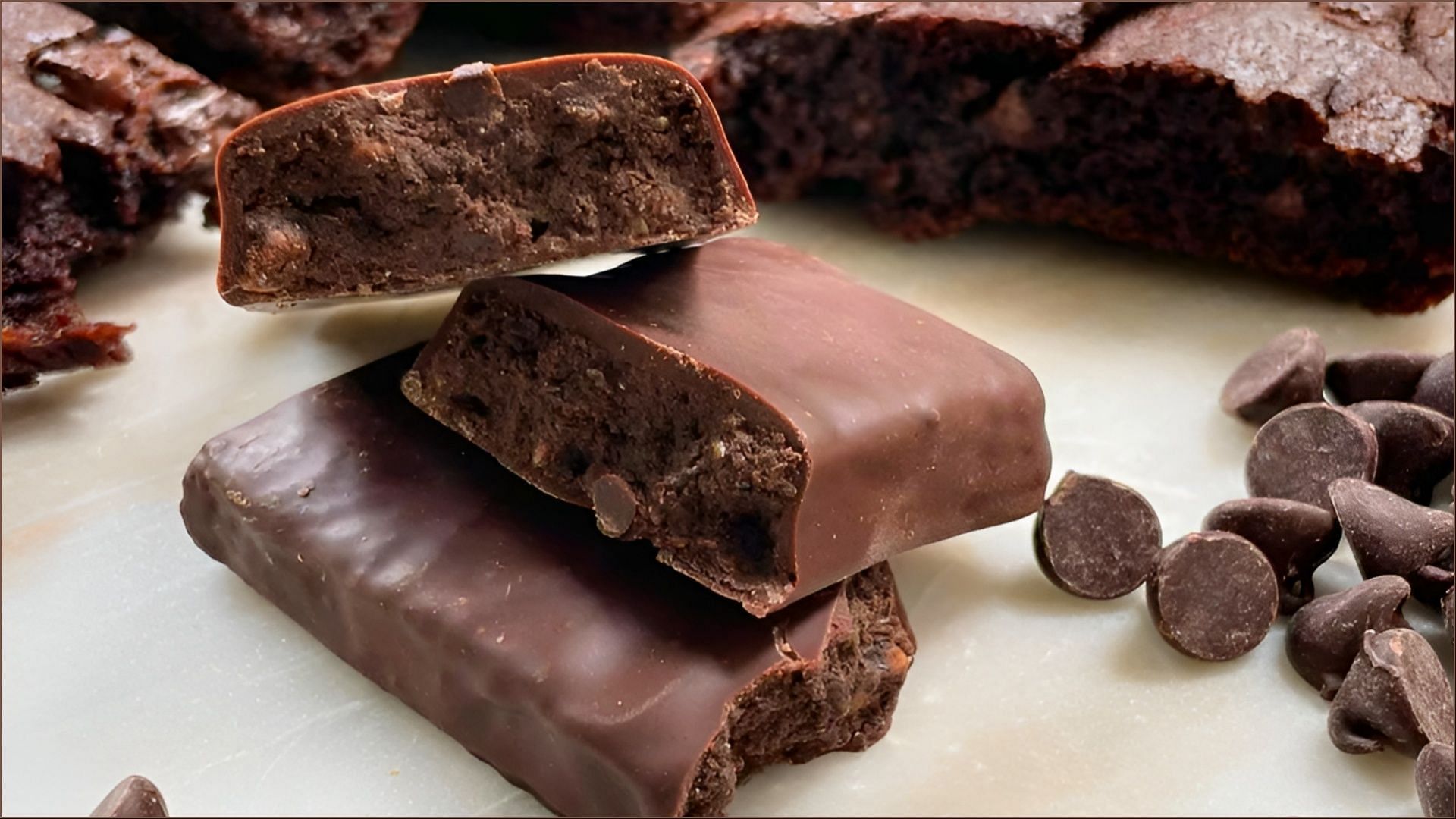 The new Dark Chocolate Brownie Crunch snack bars hit stores nationwide starting March 2 (Image via T. Bar)
