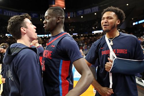 Duquesne celebrating their victory versus BYU